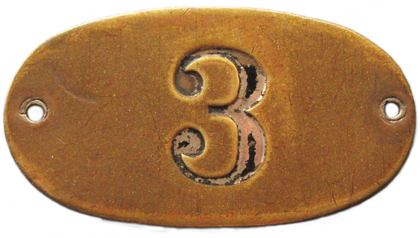 numeral 3 on brass tag